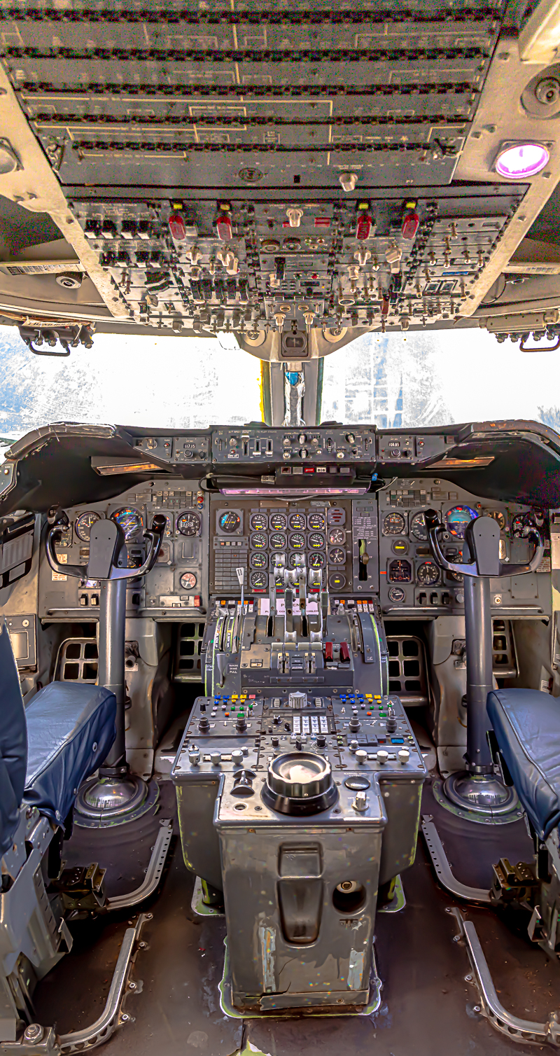 WWII-era aircraft cockpit detail — instruments and throttle